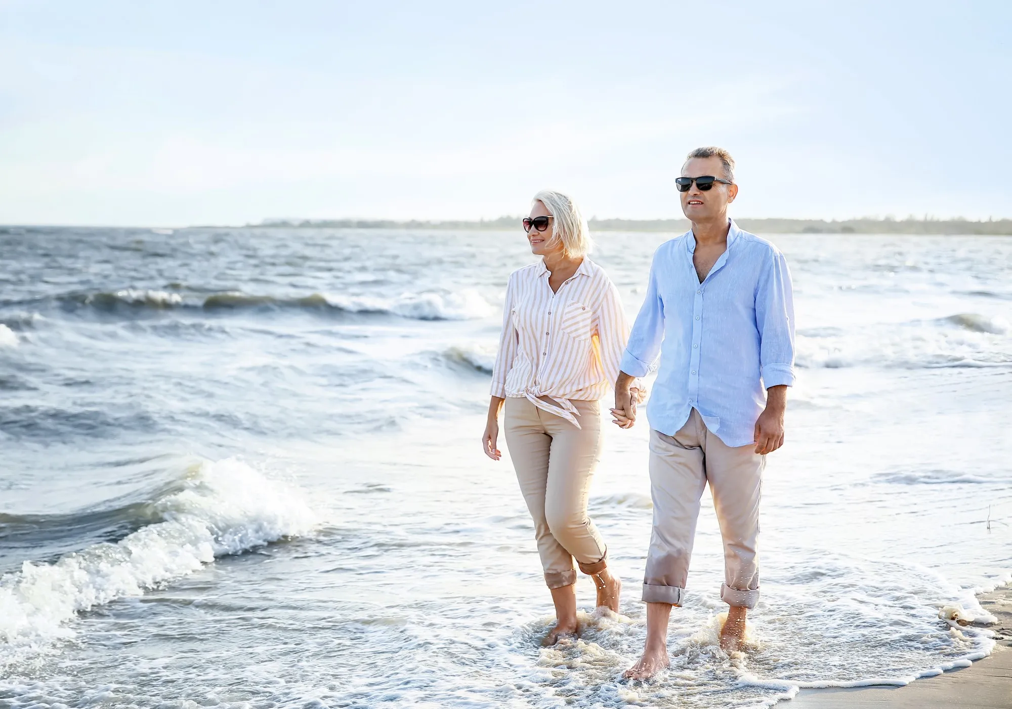 Happy mature couple at sea resort