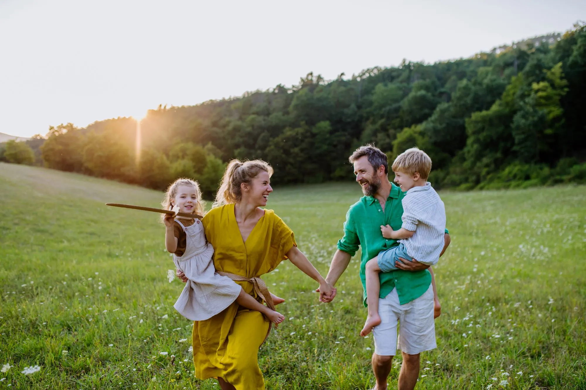 Family with 2 children spending time outdoor